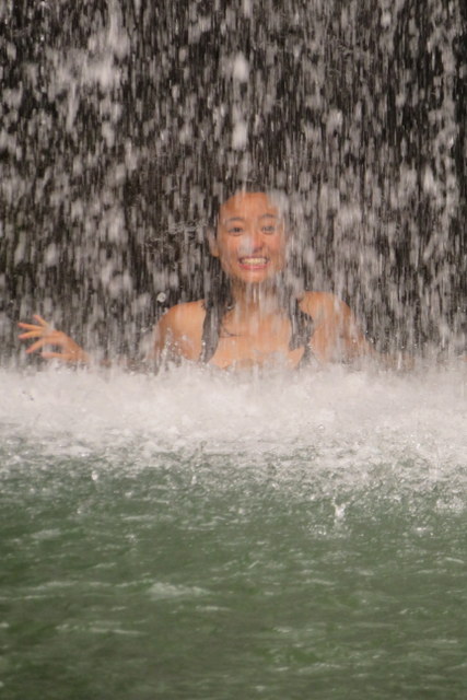 Senri celebrating the pool at the foot of the falls..