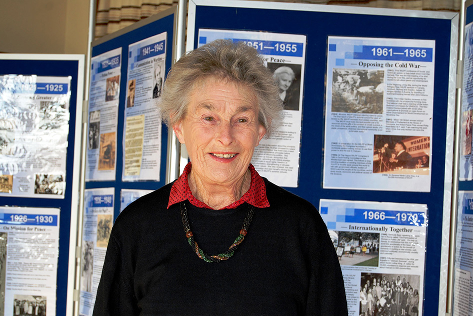 Joan with WILPF display